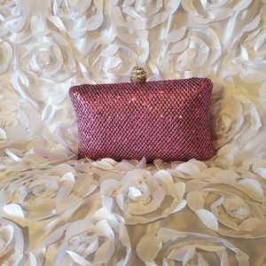 EXPRESSIONS NYC Pink party clutch.